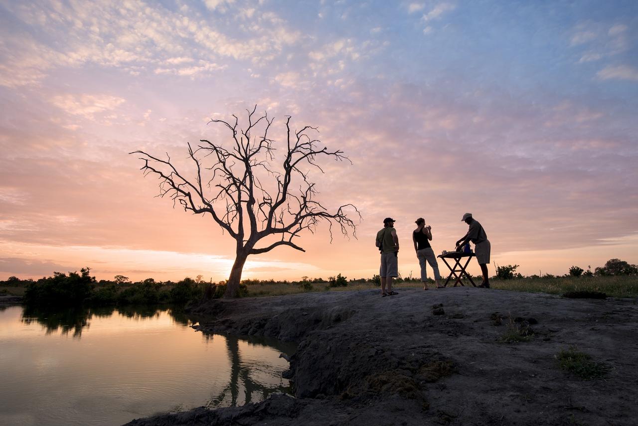 Sundowner til solnedgang, Somalisa Camp, Hwange National Park, Zimbabwe