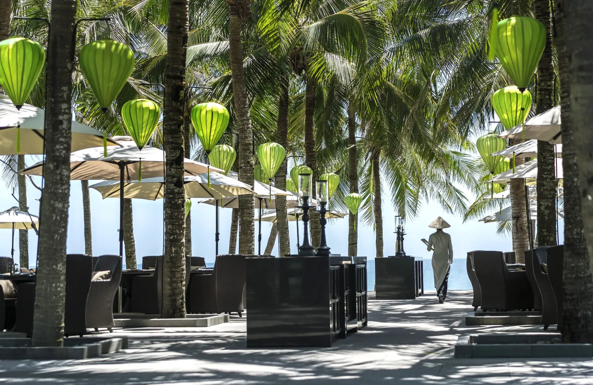Udendørs restaurant på Four Seasons The Nam Hai i Vietnam