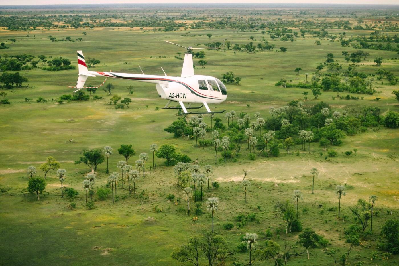 Flyv i helikopter over Eagle Island Lodge, a Belmond Safari, Botswana