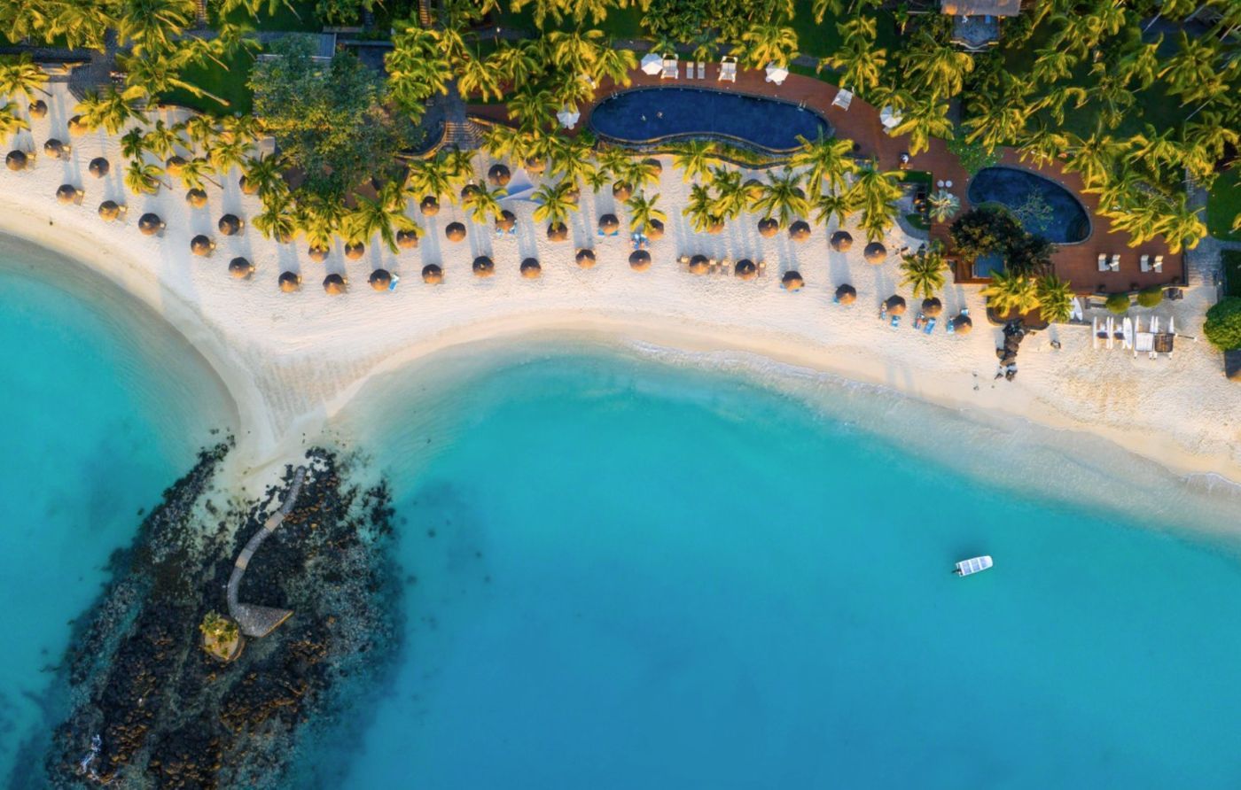 Strand og pool på Royal Palm Beachcomber Luxury, Mauritius